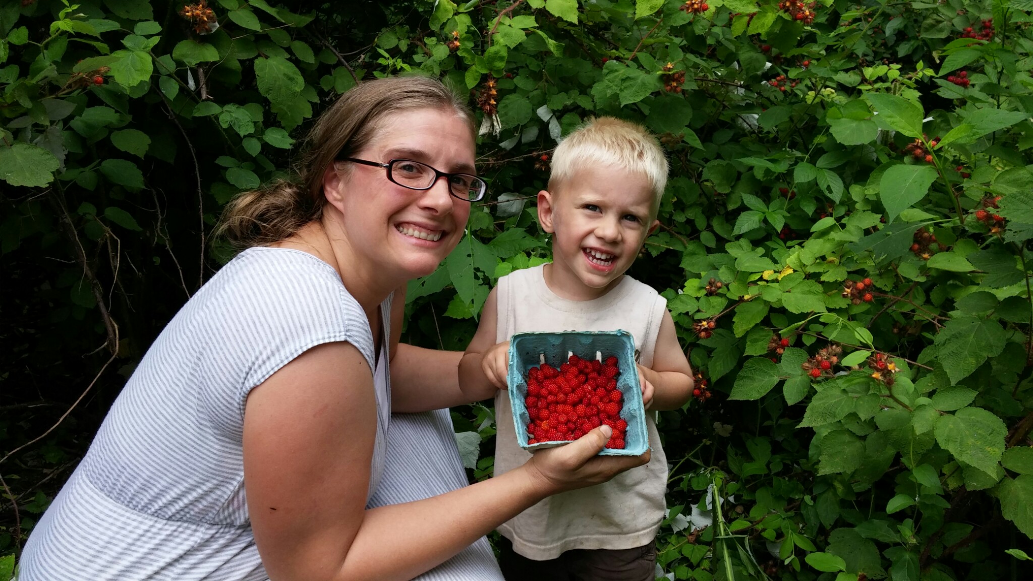 Picking berries with Mommy.