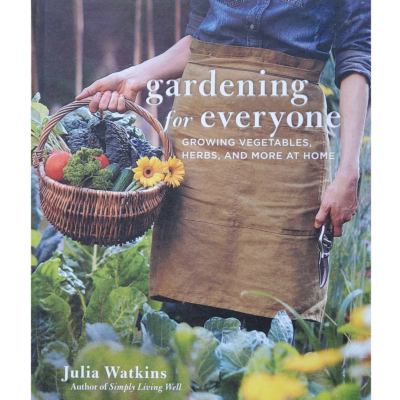 Woman picking garden produce on the cover of the Gardening for Everyone book.