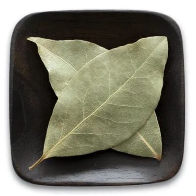 Organic bay leaves in a dish.