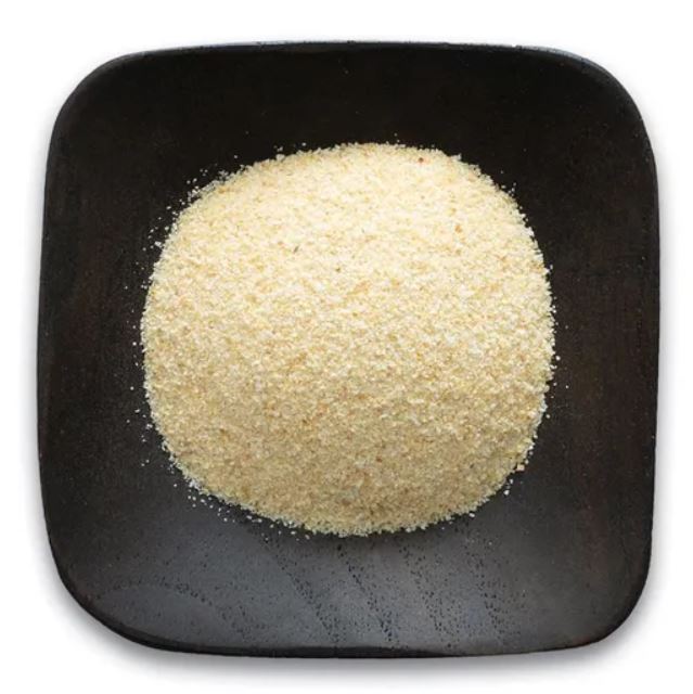 Organic Granulated Garlic - Seeds for Generations Granulated garlic in a dish.