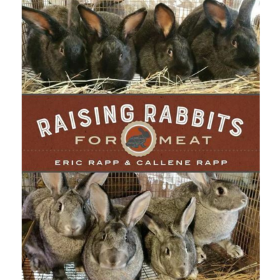 Rabbits pictured on the front cover of the Raising Rabbits for Meat book.