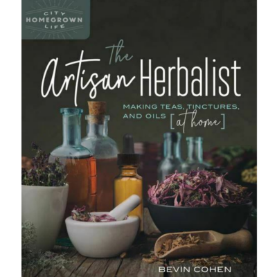 Tinctures and other herbals pictured on the front cover of The Artisan Herbalist book.