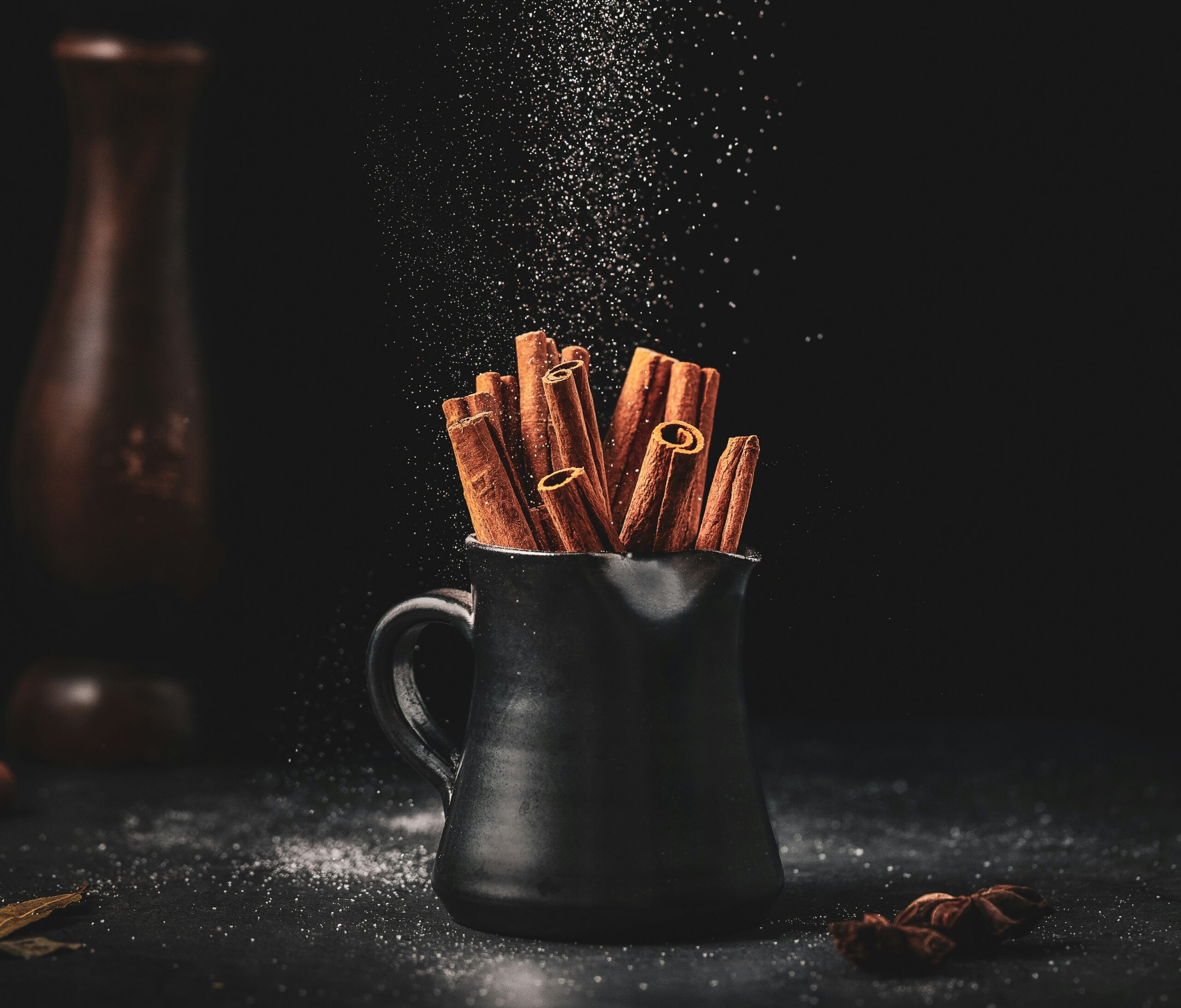 Cinnamon sticks in a mug.